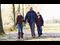 family walking in neighborhood