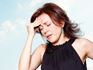 Woman with migraine