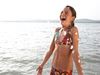 Girl laughing in the water
