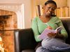 Woman writing in journal