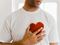 Man holding his heart