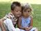 Young boy hugging young girl