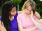 Young woman offering support to a grieving friend