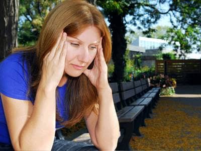 Woman with migraine headache