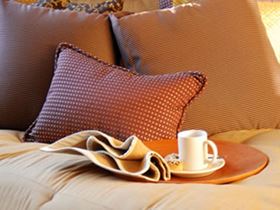 Cozy bed with tea