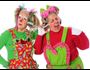 Two female clowns laughing telephone