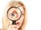 Woman with magnifying glass