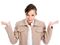 Resigned woman with her arms in the air