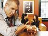 Man at bar with whiskey