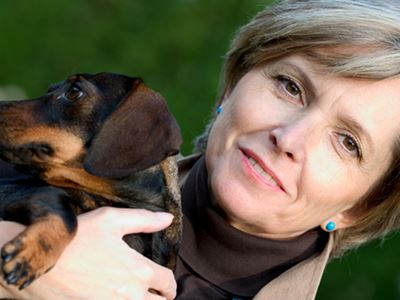 Lady holding her dog