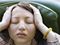 Stressed young Asian woman