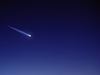 meteor shooting across the night sky