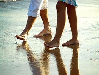 Couple walking on the beach