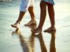 Couple walking on the beach