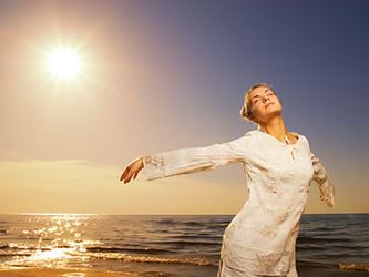 Dancing Woman by the Ocean