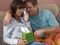 Man and woman console one another
