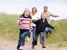 Parents and kids laughing together