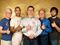 Group of men supporting breast cancer awareness