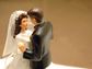 Bride and groom wedding cake topper