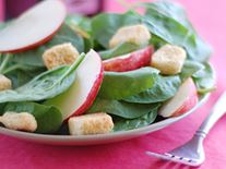 Apple, radish, crouton, and spinach salad