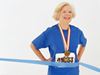 Older woman finishing a race