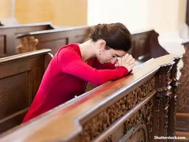 people woman praying at church