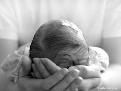 infant girl hands mother