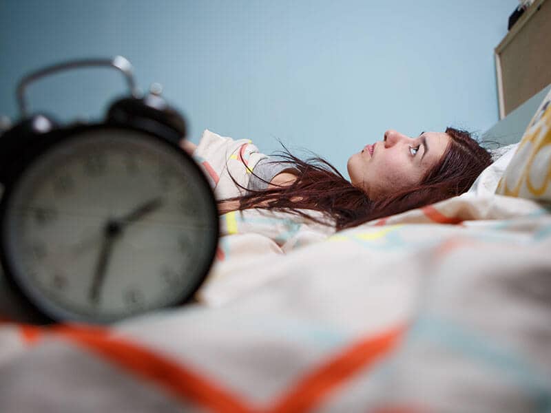 women insomnia clock 